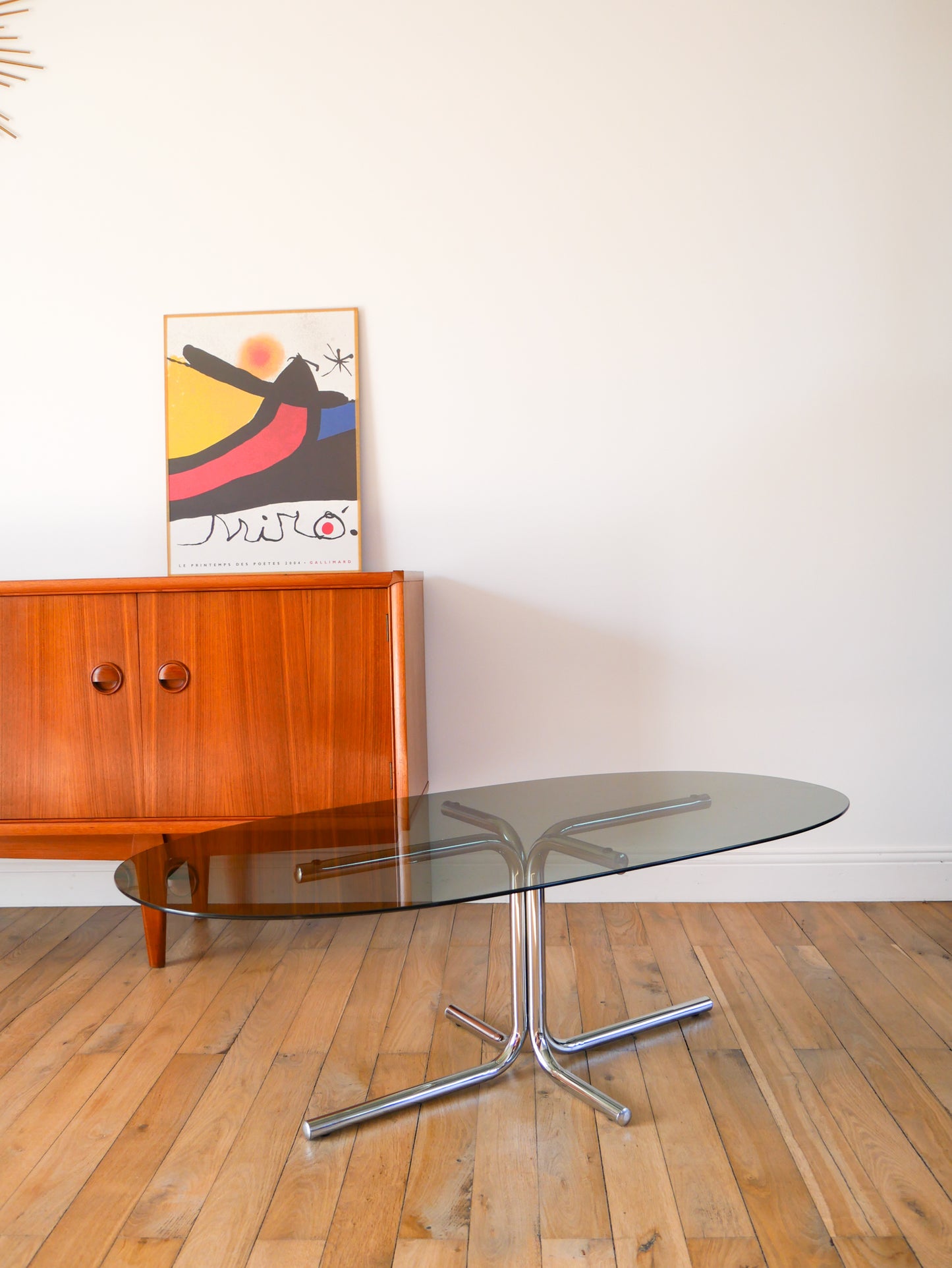 Table basse tubulaire ovale en verre et chrome, piètements étoile, Design, 1970