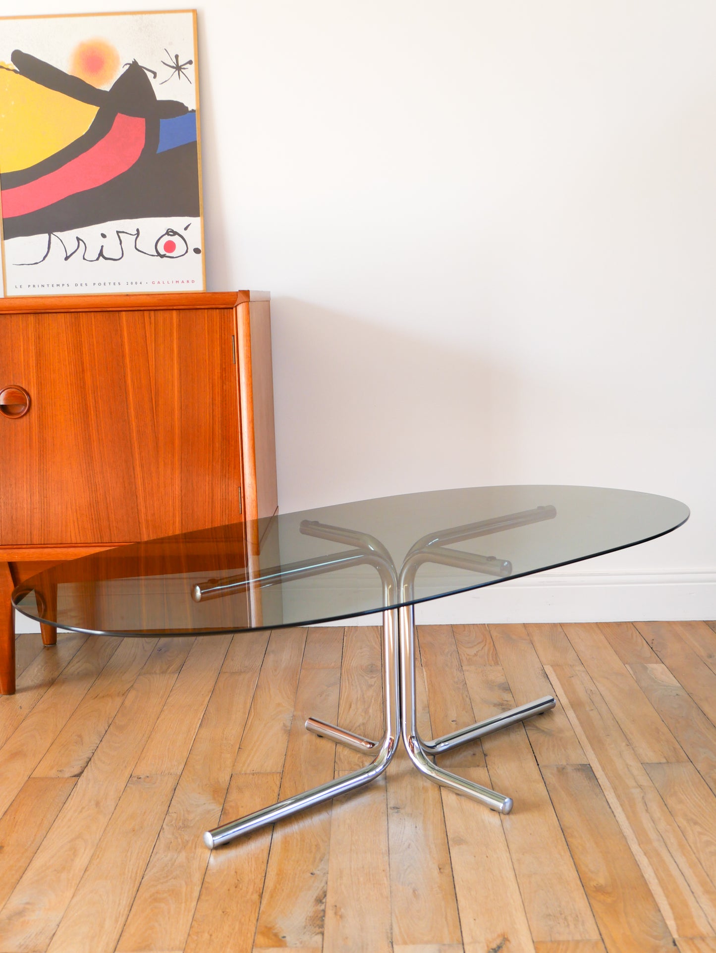 Table basse tubulaire ovale en verre et chrome, piètements étoile, Design, 1970