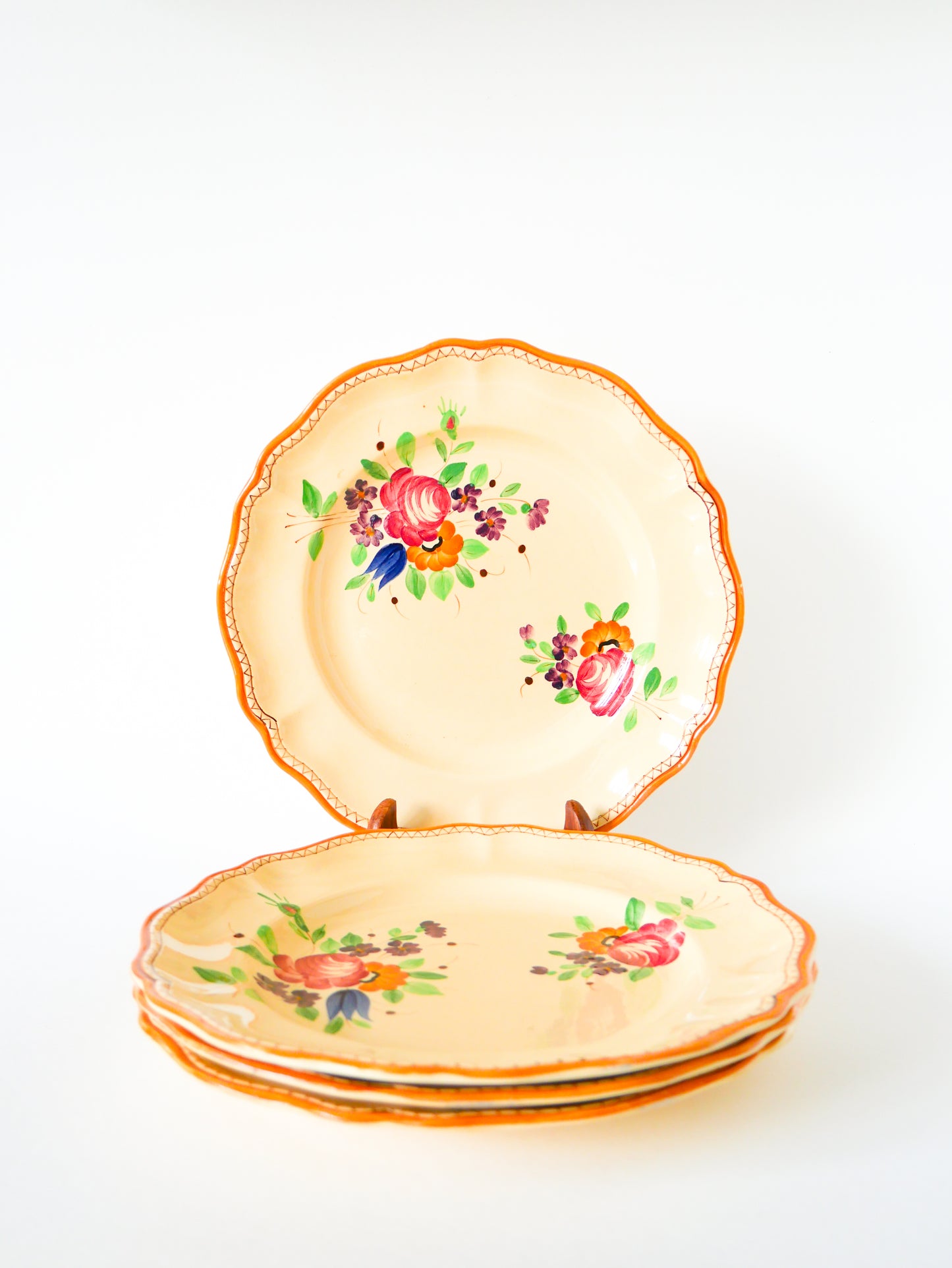 Lot de 4 grandes assiettes plates, Longchamp, 1940