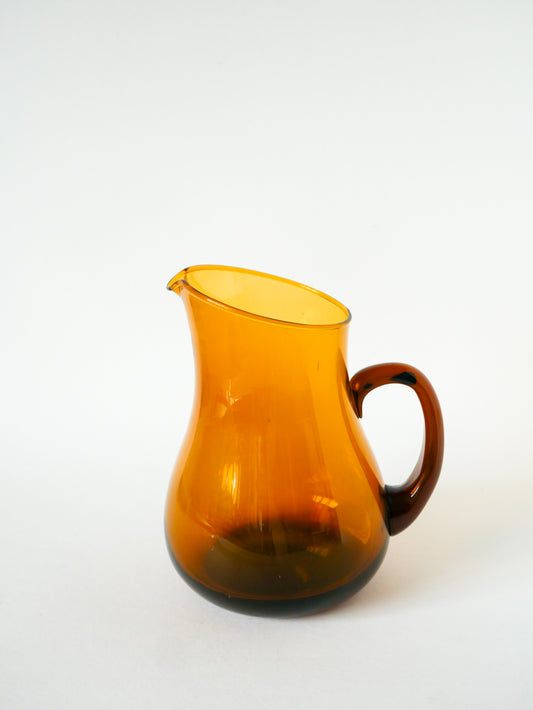 Pichet en verre ambré, Design, 1970