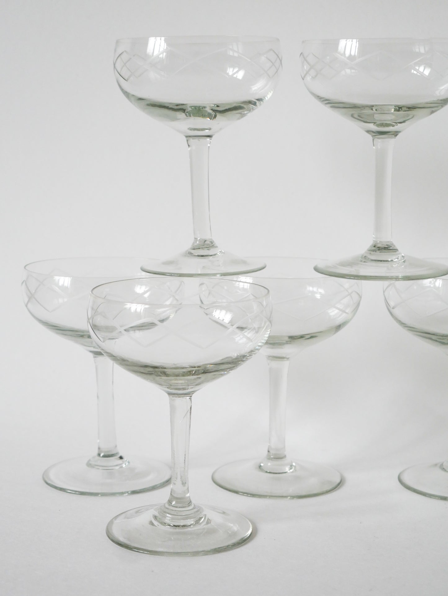 Lot de 9 coupes à champagne en cristal gravé, 1930