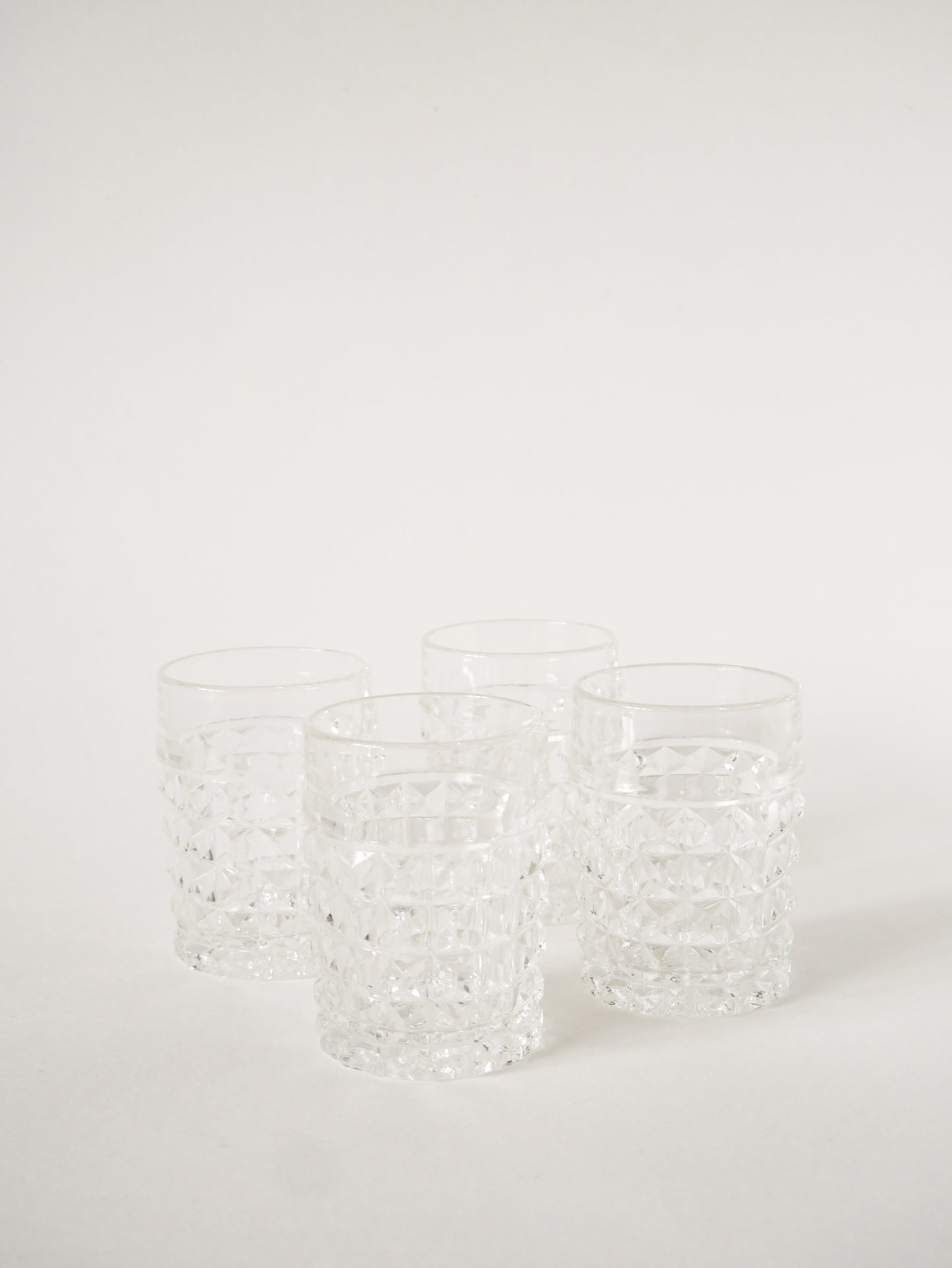 Ensemble de 4 verres à whisky facettés, 1970