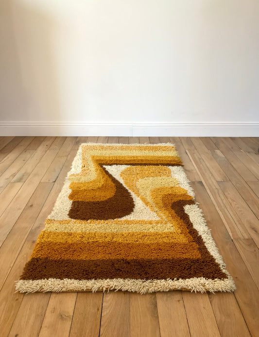 Tapis jaune psychédélique années 70